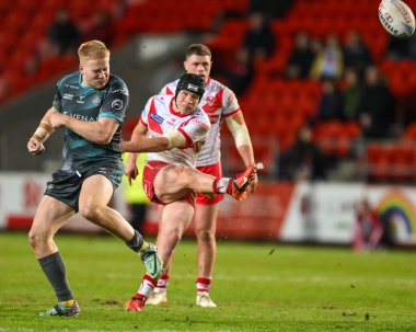 St. Helens takımından Jonny Lomax, 25 Nisan 202 'de St Helens-Huddersfield Giants maçında Betfred Süper Lig 9. Raundunu kazanmak için son dakikada bir düşüş golü attı.