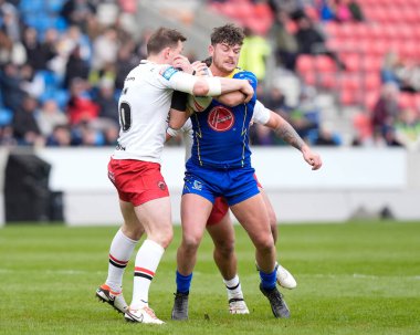 Jordy Crowther of Warrington Wolves runs at the Salford Red Devils defence during the Betfred Super League Round 9 match Salford Red Devils vs Warrington Wolves at Salford Community Stadium, Eccles, United Kingdom, 27th April 202 clipart