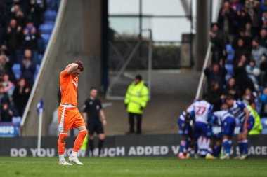 Sonny Carey of Blackpool reacts to his side conceding a goal to make it 3-1 during the Sky Bet League 1 match Reading vs Blackpool at Select Car Leasing Stadium, Reading, United Kingdom, 27th April 202 clipart