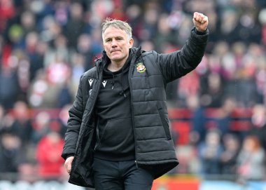 Phil Parkinson manager of Wrexham celebrates the full time result, during the Sky Bet League 2 match Wrexham vs Stockport County at SToK Cae Ras, Wrexham, United Kingdom, 27th April 202 clipart