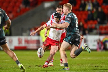 St. Helens takımından Jonny Lomax, 25 Nisan 202 'de St Helens-Huddersfield Giants maçında Betfred Süper Lig 9. Raundunu kazanmak için son dakikada bir düşüş golü attı.
