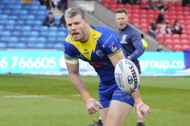 Warrington Wolves 'tan Lachlan Fitzgibbon, 27 Nisan 202' de Salford Community Stadyumu 'nda oynanan 9. Betfred Süper Lig karşılaşmasından önce ısınıyor.