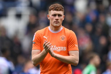 Sonny Carey of Blackpool applauds the fans at the end of thep Sky Bet League 1 match Reading vs Blackpool at Select Car Leasing Stadium, Reading, United Kingdom, 27th April 202 clipart