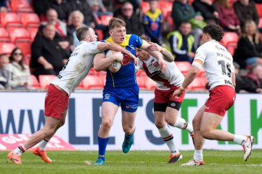Matty Nicholson of Warrington Wolves runs at the Salford Red Devils defence during the Betfred Super League Round 9 match Salford Red Devils vs Warrington Wolves at Salford Community Stadium, Eccles, United Kingdom, 27th April 202 clipart