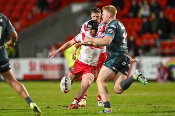 stock image Jonny Lomax of St. Helens kicks a drop goal in the last minute to win the Betfred Super League Round 9 match St Helens vs Huddersfield Giants at Totally Wicked Stadium, St Helens, United Kingdom, 25th April 202