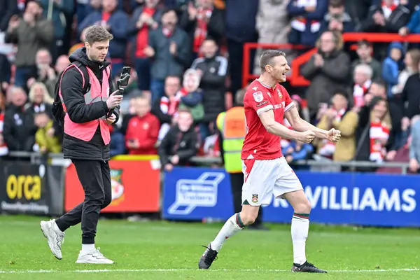 stock image Paul Mullin of Wrexham celebrates the full time result, during the Sky Bet League 2 match Wrexham vs Stockport County at SToK Cae Ras, Wrexham, United Kingdom, 27th April 202