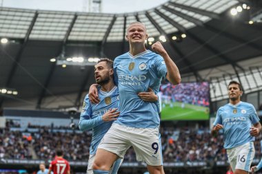 Manchester City 'den Erling Haaland, 4 Mayıs 2024' te Etihad Stadyumu 'nda oynanan Premier League maçında Manchester City ve Wolverhampton Wanderers maçında 1-0' lık galibiyetini kutluyor.