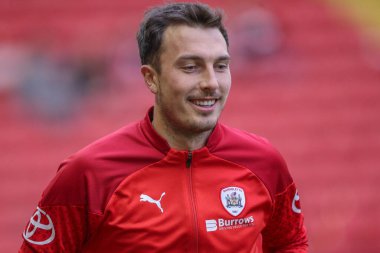 Barnsley 'den Josh Earl, Sky Bet Ligi 1 Sky Bet Ligi 1 Promotion Play-off 1 Promosyon yarı final ilk ayak maçı sırasında Oakwell, Barnsley, Birleşik Krallık, 3 Mayıs 2024' te Bolton Wanderers 'a karşı ısınma turunda