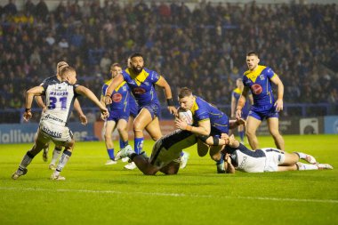 Warrington Wolves 'tan George Williams, 3 Mayıs 2024' te Warrington, İngiltere 'de oynanan Betfred Süper Lig 10. Raundunda Hull FC' ye karşı Warrington Wolves maçında Hull Stadyumu 'nda Hull FC deneme çizgisinden kısa devre yaptı.