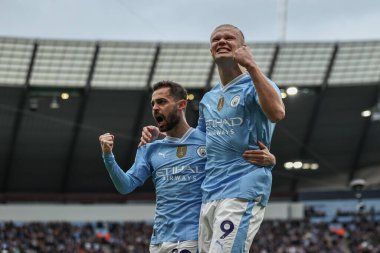 Manchester City 'den Erling Haaland, 4 Mayıs 2024' te Etihad Stadyumu 'nda oynanan Premier League maçında Manchester City ve Wolverhampton Wanderers maçında 1-0' lık galibiyetini kutluyor.