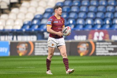 Huddersfield Giants 'tan Adam Clune, 3 Mayıs 2024' te John Smith 'in Stadyumu' nda oynanan 10. Huddersfield Giants - Salford Red Devils maçında oynanan Betfred Süper Lig karşılaşması öncesinde ısınma turunda.