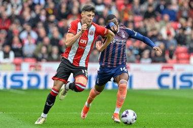 Sheffield United takımından Anel Ahmedhodi, Premier League maçı sırasında Nottingham Ormanı 'ndan Callum Hudson-Odoi' nin baskısıyla Sheffield United Nottingham Ormanı 'na karşı Bramall Lane, Sheffield, Birleşik Krallık' ta 4 Mayıs 2024 'te oynanan maçta elendi. 