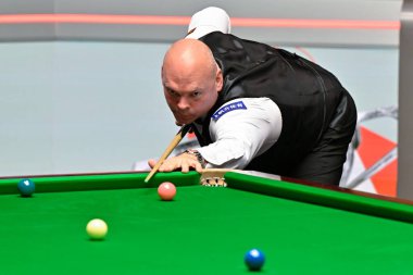 Stuart Bingham takes a shot, during the Cazoo World Championships 2024 at Crucible Theatre, Sheffield, United Kingdom, 3rd May 2024 clipart