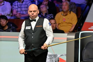 Stuart Bingham looks over the table, during the Cazoo World Championships 2024 at Crucible Theatre, Sheffield, United Kingdom, 3rd May 2024 clipart