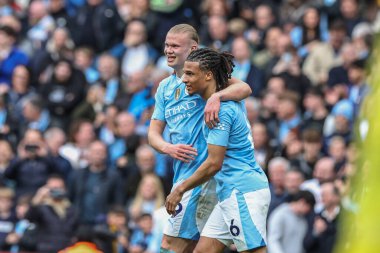 Manchester City 'den Erling Haaland, 4 Mayıs 2024' te Etihad Stadyumu 'nda oynanan Premier League maçında Manchester City ile Wolverhampton Wanderers maçında 2-0' lık galibiyetini kutluyor.