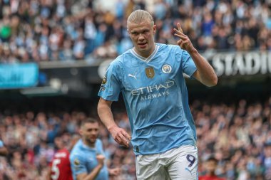 Manchester City 'den Erling Haaland, 4 Mayıs 2024' te Etihad Stadyumu 'nda oynanan Premier League maçında Manchester City ile Wolverhampton Wanderers maçında 3-0 kazanma golünü kutluyor.