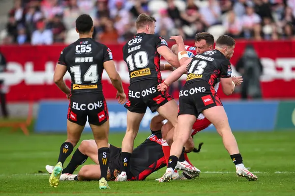 stock image Jai Whitbread of Hull KR receives a hi shot from Morgan Knowles of St. Helens resulting in a yellow card during the Betfred Super League Round 10 match Hull KR vs St Helens at Sewell Group Craven Park, Kingston upon Hull, United Kingdom, 4th May 2024