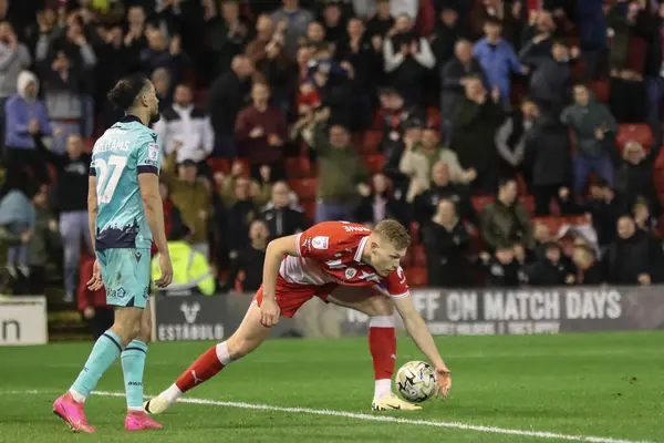 stock image Sam Cosgrove of Barnsley takes the ball back to the centre circle after he scores to make it 1-2 during the Sky Bet League 1 Sky Bet League 1 Promotion Play-offs Semi-final first leg match Barnsley vs Bolton Wanderers at Oakwell, Barnsley, UK