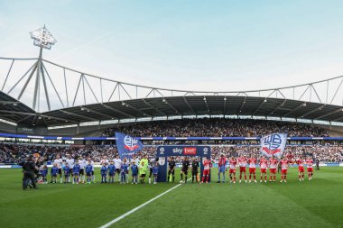 Both teams line up during the Sky Bet League 1 Play-offs Semi-final second leg match Bolton Wanderers vs Barnsley at Toughsheet Community Stadium, Bolton, United Kingdom, 7th May 2024 clipart