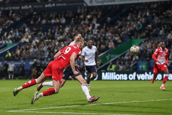 stock image Sam Cosgrove of Barnsley scores to make it 2-3 during the Sky Bet League 1 Play-offs Semi-final second leg match Bolton Wanderers vs Barnsley at Toughsheet Community Stadium, Bolton, United Kingdom, 7th May 2024