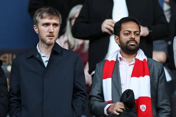 stock image Barnsley FC board members Neerav Parekh and James Patrick Cryne are in attendance during the Sky Bet League 1 Play-offs Semi-final second leg match Bolton Wanderers vs Barnsley at Toughsheet Community Stadium, Bolton, United Kingdom, 7th May 2024