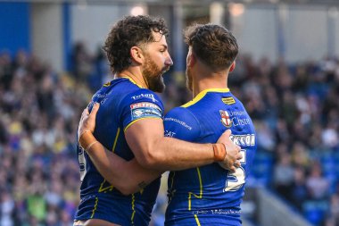 Warrington Wolves 'dan Toby King, 9 Mayıs 2024' te Warrington Wolves vs Hull KR 'da oynanan Betfred Süper Lig karşılaşmasında denemesini kutluyor.