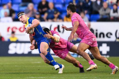 Warrington Wolves 'dan George Williams, 9 Mayıs 2024' te Warrington, İngiltere 'deki Halliwell Jones Stadyumu' nda oynanan 11. Betfred Süper Lig karşılaşmasında Hull KR 'dan Sauaso Sue tarafından yenildi.