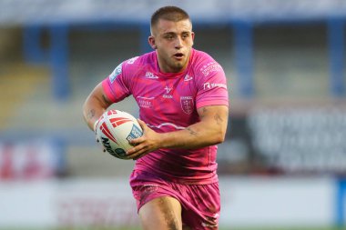 Hull KR 'dan Mikey Lewis, 9 Mayıs 2024' te İngiltere 'nin Warrington kentinde oynanan 11. Betfred Süper Lig karşılaşmasında topu kırıyor.