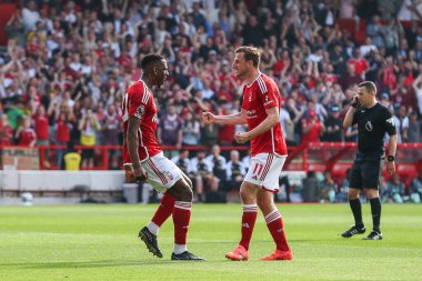 Willy Boly of Nottingham Forest celebrates his goal to make it 1-1 during the Premier League match Nottingham Forest vs Chelsea at City Ground, Nottingham, United Kingdom, 11th May 2024 clipart