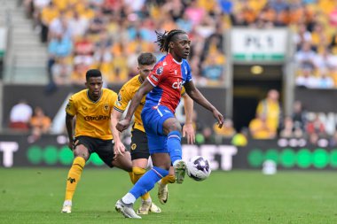 Kristal Saray 'dan Eberechi Eze, Premier Lig maçı sırasında Wolverhampton Wanderers, Molineux, Wolverhampton, İngiltere' deki Crystal Palace 'a karşı 11 Mayıs 2024' te topu kontrol altına aldı. 