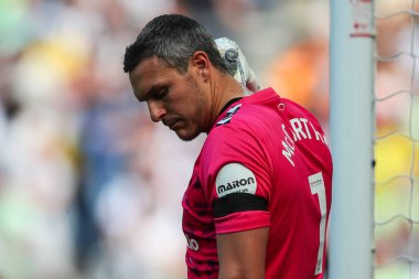 Alex McCarthy of Southampton tips water down the back of his neck to stay cool during the Sky Bet Championship Play-Off Semi-Final First Leg match West Bromwich Albion vs Southampton at The Hawthorns, West Bromwich, United Kingdom, 12th May 2024  clipart