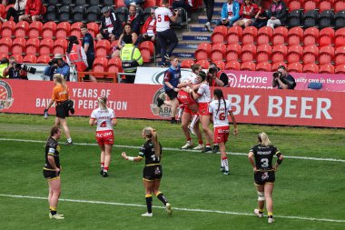 Phoebe Hook of St Helens celebrates their try during the Betfred Women's Challenge Cup match St Helens Women vs York City Knights Women at Eco-Power Stadium, Doncaster, United Kingdom, 18th May 2024
