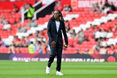 Melvine Malard of Manchester United Women inspects the pitch ahead of the match, during the The FA Women's Super League match Manchester United Women vs Chelsea FC Women at Old Trafford, Manchester, United Kingdom, 18th May 2024  clipart