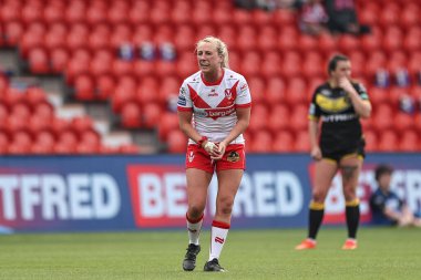 Jodie Cunningham of St Helens shouts words of encouragement to team mates after going 12-0 up during the Betfred Women's Challenge Cup match St Helens Women vs York City Knights Women at Eco-Power Stadium, Doncaster, United Kingdom, 18th May 2024
