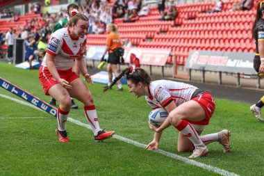 Leah Burke of St Helens goes over for a try during the Betfred Women's Challenge Cup match St Helens Women vs York City Knights Women at Eco-Power Stadium, Doncaster, United Kingdom, 18th May 2024