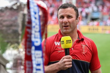 Willie Peters Head Coach of Hull KR speaks to BBC Sport during the Betfred Challenge Cup Semi-Final Hull KR v Wigan Warriors at Eco-Power Stadium, Doncaster, United Kingdom, 18th May 2024 clipart