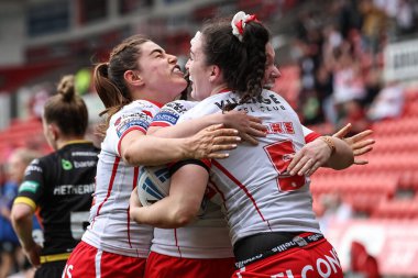 Leah Burke of St Helens celebrates their try during the Betfred Women's Challenge Cup match St Helens Women vs York City Knights Women at Eco-Power Stadium, Doncaster, United Kingdom, 18th May 2024