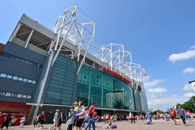 A general external view of Old Trafford as fans arrive ahead of the match, during the The FA Women's Super League match Manchester United Women vs Chelsea FC Women at Old Trafford, Manchester, United Kingdom, 18th May 2024 
