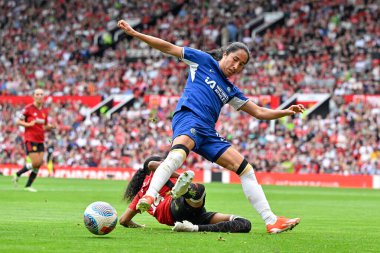Jayde Riviere of Manchester United Women tackles Mayra Ramrez of Chelsea Women, during the The FA Women's Super League match Manchester United Women vs Chelsea FC Women at Old Trafford, Manchester, United Kingdom, 18th May 2024 