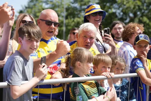 stock image Warrington Wolves fans await their sides arrival before the Betfred Challenge Cup Semi-Final match Huddersfield Giants vs Warrington Wolves at Totally Wicked Stadium, St Helens, United Kingdom, 19th May 2024