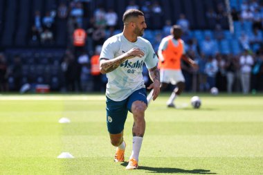 Kyle Walker of Manchester City during the pre match warm up ahead of the Premier League match Manchester City vs West Ham United at Etihad Stadium, Manchester, United Kingdom, 19th May 2024 