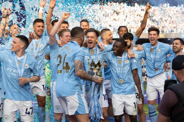 Kyle Walker lifts Premier League Trophy with Kevin De Bruyne, Jack Grealish, Jrmy Doku and John Stones of Manchester City during the Premier League match Manchester City vs West Ham United at Etihad Stadium, Manchester, United Kingdom, 19th May 2024 