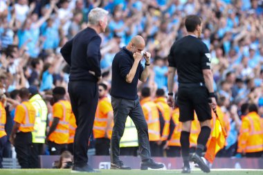 Pep Guardiola manager of Manchester City celebrates the third goal for his team in the second half of the Premier League match Manchester City vs West Ham United at Etihad Stadium, Manchester, United Kingdom, 19th May 2024 