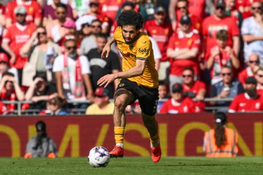 Wolverhampton Wanderers takımından Rayan At-Nouri, 19 Mayıs 2024 'te Anfield, Liverpool, Birleşik Krallık' ta oynanan Premier League maçında Wolverhampton Wanderers 'a karşı topa vuruyor. 