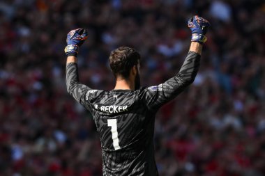 Liverpool 'dan Alisson Becker, 19 Mayıs 2024' te İngiltere 'nin Liverpool kentinde oynanan Premier League maçında Wolverhampton Wanderers' a karşı 2-0 'lık galibiyet golünü kutluyor. 