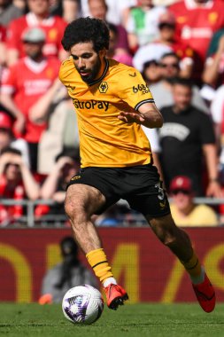 Wolverhampton Wanderers takımından Rayan At-Nouri, 19 Mayıs 2024 'te Anfield, Liverpool, Birleşik Krallık' ta oynanan Premier League maçında Wolverhampton Wanderers 'a karşı topa vuruyor. 