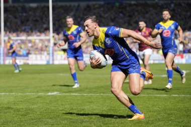 Warrington Wolves 'tan Matty Ashton, 19 Mayıs 2024' te Birleşik Krallık 'ın Wicked Stadyumu' nda oynanan ve Huddersfield Giants 'ın Warrington Wolves' a karşı oynadığı Betfred Challenge Kupası yarı final maçında gol atmak için ayrıldı.