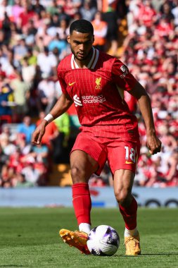 Cody Gakpo of Liverpool passes the ballduring the Premier League match Liverpool vs Wolverhampton Wanderers at Anfield, Liverpool, United Kingdom, 19th May 2024  clipart