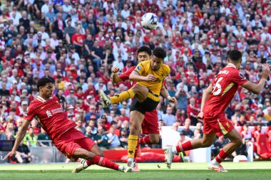 Wolverhampton Wanderers 'dan Joo Gomes kalede şut çekiyor ama Liverpool' lu Jarell Quansah, Liverpool 'a karşı Wolverhampton Wanderers maçında 19 Mayıs 2024' te Anfield, Liverpool, İngiltere 'de engelleniyor. 