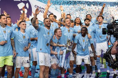 Kevin De Bruyne of Manchester City lifts the Premier League Trophy during the Premier League match Manchester City vs West Ham United at Etihad Stadium, Manchester, United Kingdom, 19th May 2024 
